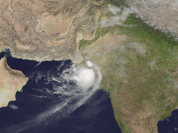 Cyclone Biparjoy is pushing into the coast as wind-driven rain lashed the shores of Pakistan and India