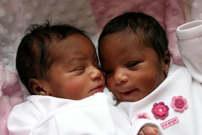 A woman gives birth to twins from separate fathers