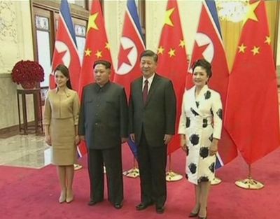 Kim Jong-un hold talks with  Xi Jinping, says N Korea  'committed to denuclearisation'