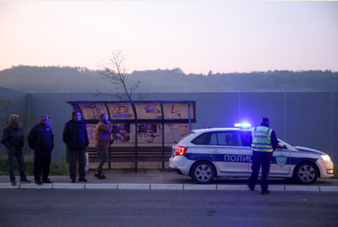 A day after 9 people were killed at a school, 8 people were shot and killed in a Serbian town