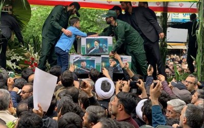 Thousands Gather for Iranian President Raisi's Funeral in Tabriz Amid Mixed Reactions