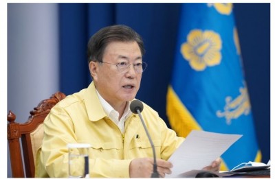 S.Korea: Moon says to halt further easing of distancing rules amid spiking infections