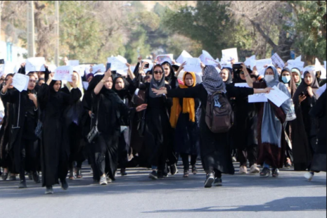 Afghan women take to the streets after a deadly school attack