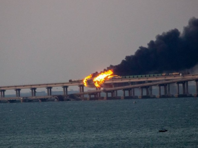 Moscow claims a car bomb set a crucial Crimean bridge on fire