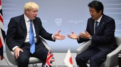 ब्रिटेन ने जापान के साथ एक मुक्त व्यापार समझौते पर किए हस्ताक्षर