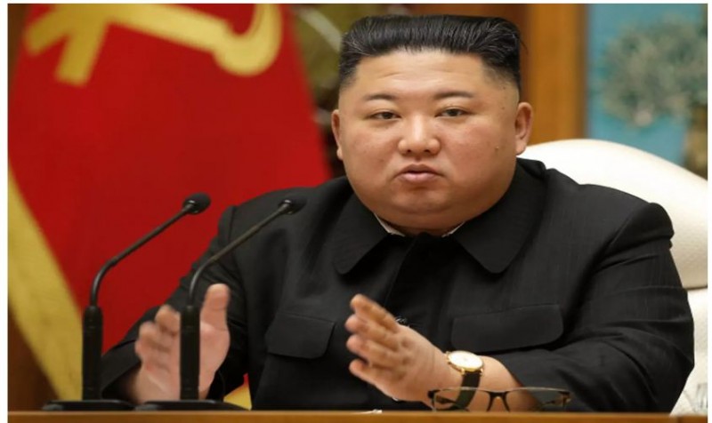 Kim promises to strengthen N.Korea's military, maintain viral curbs.