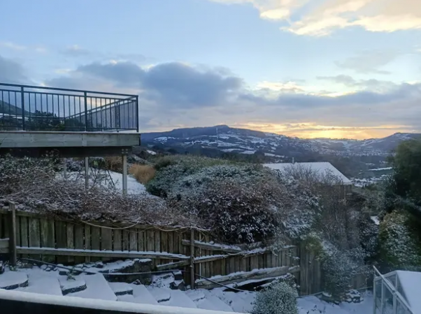 New Zealand begins spring with unexpected snow following its warmest winter ever