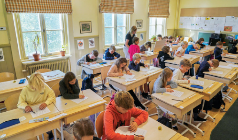 Sweden's Shift Back to Traditional Education: Emphasizing Books and Handwriting