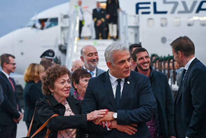 Israeli Prime Minister Yair Lapid and Holocaust survivors arrive in Berlin