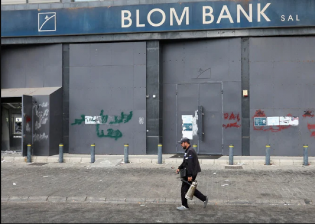 Banks in Lebanon close their doors as protesters demand the release of detainees
