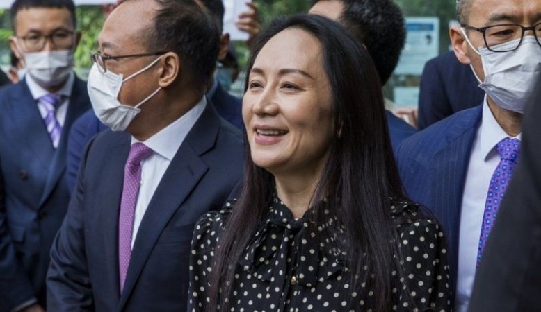 Meng Wanzhou flies back to China after deal with US