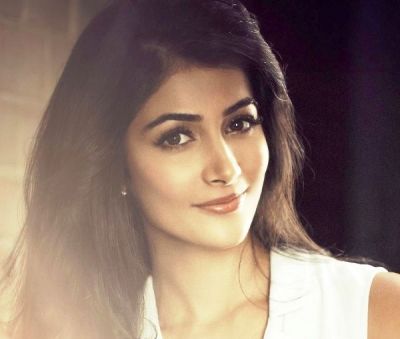 See pics! Pooja Hegde's new look in white color mini jumpsuit