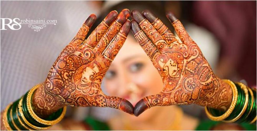 Flaunts your bridal look more with best Mehendi designs !!!