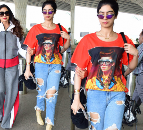 Khushi Kapoor looks funky in her rugged denim jeans and an orange -T