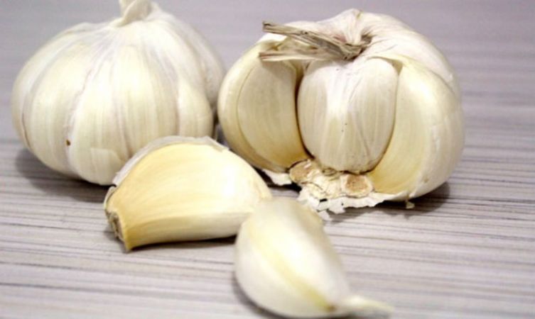 Garlic will  remove problems like scars, wrinkles, acne, eczema
