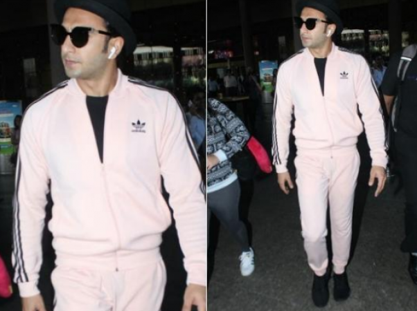 Catch! Ranveer Singh captured in a pretty-pink cool stud airport look