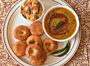 Serve Panchmel Dal with Rajasthani Bati