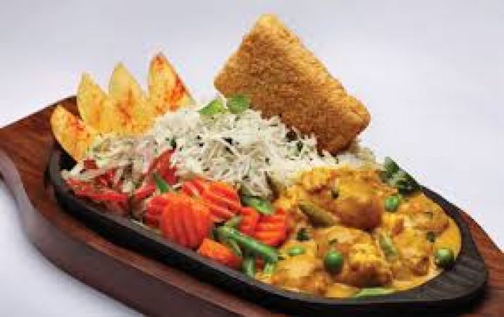 Here is the recipe of mouth-watering Spicy Paneer Sizzler