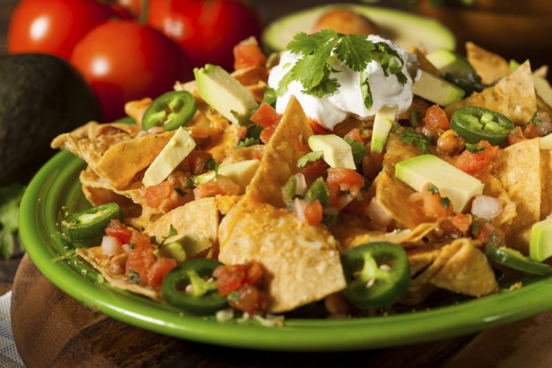 Have a tangy and tasty Nachos for your evening party snacks!!