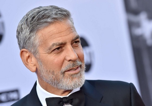 George Clooney reveals his latest role put him in hospital.