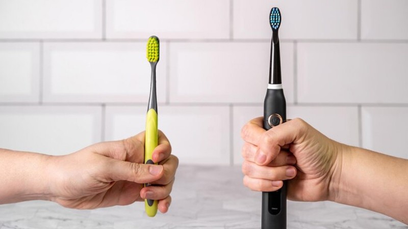 Which toothbrush is more beneficial for teeth, electric or manual?