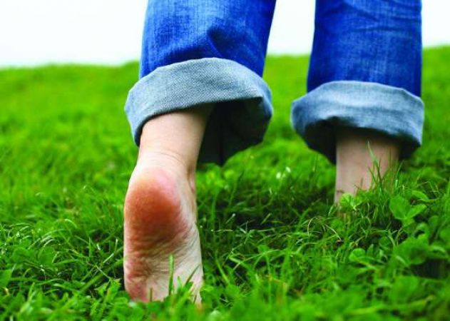 Amazing benefits of walking bare foot on green