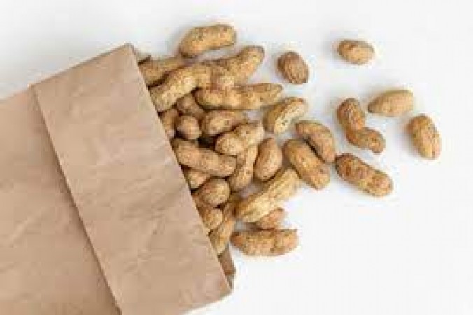 Why is it advised to eat peanuts in winter?