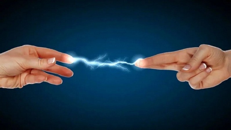 Why You Experience a Mild Electric Shock When Touching Another Person