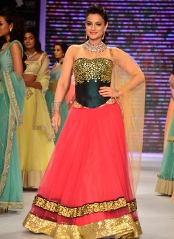 These stunning Mirror work lehenga's will falunt your traditional look