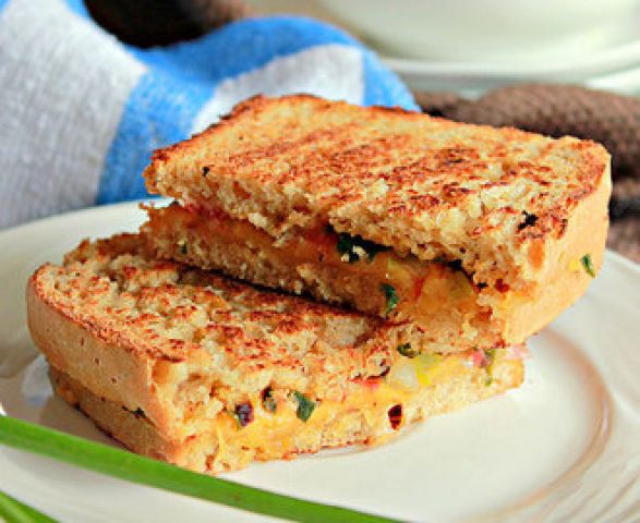 Enjoy sumptuous and tasteful 'Cheese and Spring Onion Sandwich'