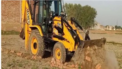 Yogi's bulldozer runs over illegal property of SP MLA Nahid Hasan's relative