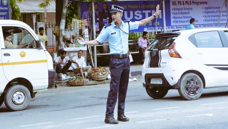 Traffic policemen seen dancing and singing on street in Assam