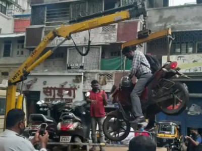 Traffic police's deadly action, youth hanging in air with bike