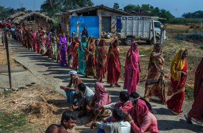 Angry women beats illegal liquor businessmen with broom and sticks