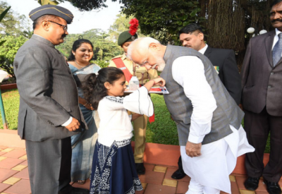 Armed Forces Flag Day: This girl put flag in PM Modi's jacket