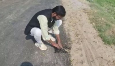 ख़बरों में छाया हाथ से सड़क उखाड़ने का वीडियो, हैरान कर देने वाला है मामला