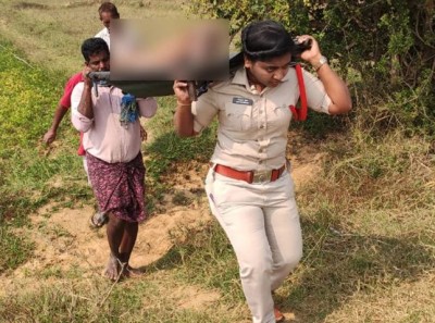 Woman Sub-Inspector carries unidentified  dead body after locals refuse to help