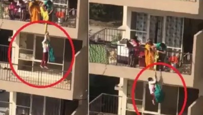 Mother tied her son to a sari and hung him from 10th floor, people shocked after watching the video