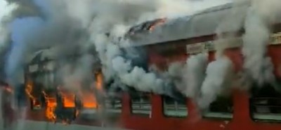 Video: Fire breaks out in two coaches of train, chaos