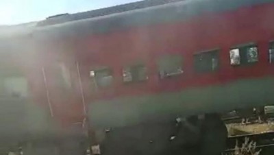 अचानक ट्रेन से निकलने लगा धुआं, खिड़की से कूदे यात्री, मचा हड़कंप