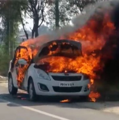 Fire breaks out in a moving car