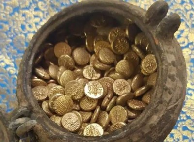 A pot filled with gold coins fund during excavation in this temple