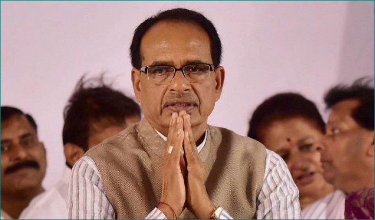 CM Shivraj listens to tribal woman's appeal in crowd