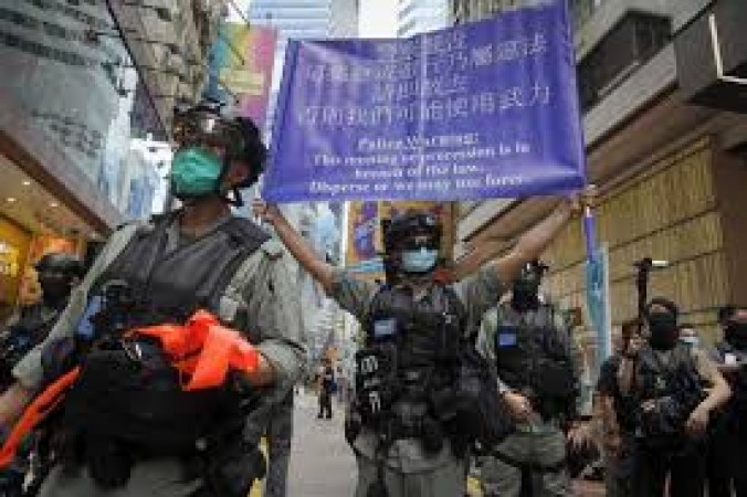 हांगकांग पुलिस ने प्रदर्शनकारियों को दी कानूनी धमकी, नियम तोड़ने पर होगी सख्‍त कार्रवाई