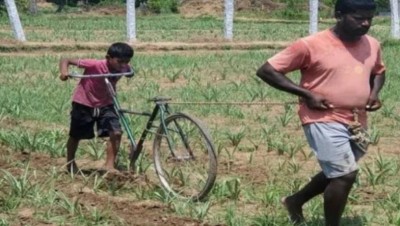 Tamil Nadu: Father forced to plough farm with the help of son's bicycle