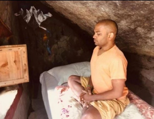 This devotee meditates in Kedarnath cave after the Chardham Yatra