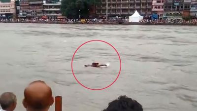 VIDEO: Young man swept across Ganges, rescued by policeman