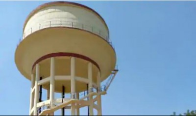 Woman climbs water tank after not getting justice