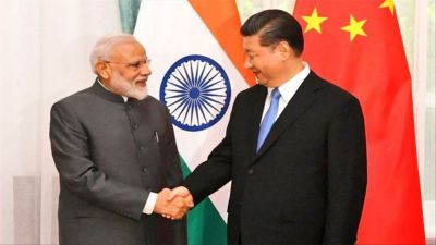 Xi Jinping meets PM Modi, says India and China not a threat to each other