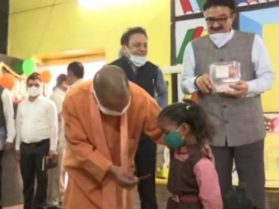 CM Yogi arrives in UP after 11 months to meet children with chocolate